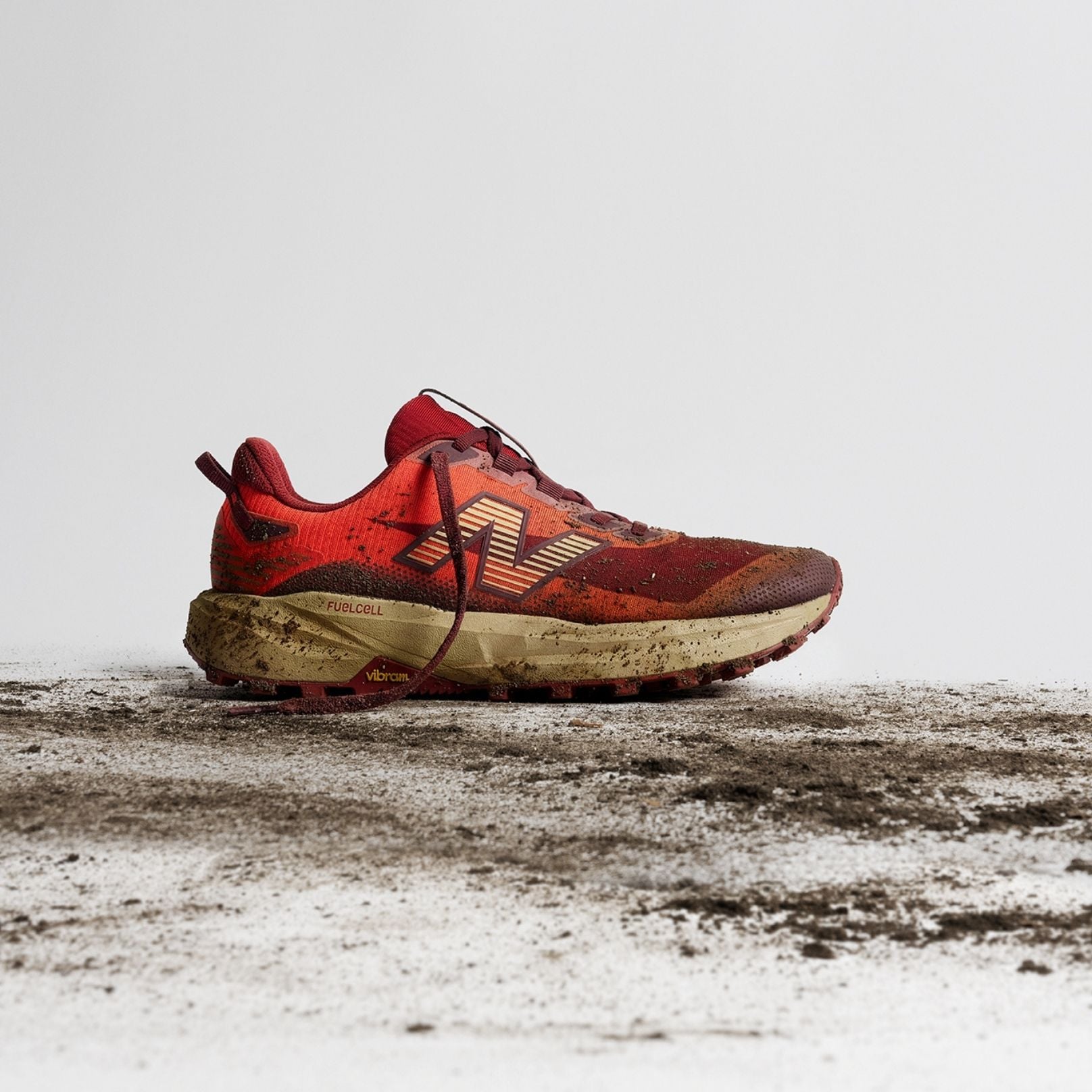 Single shoe on dirt ground.